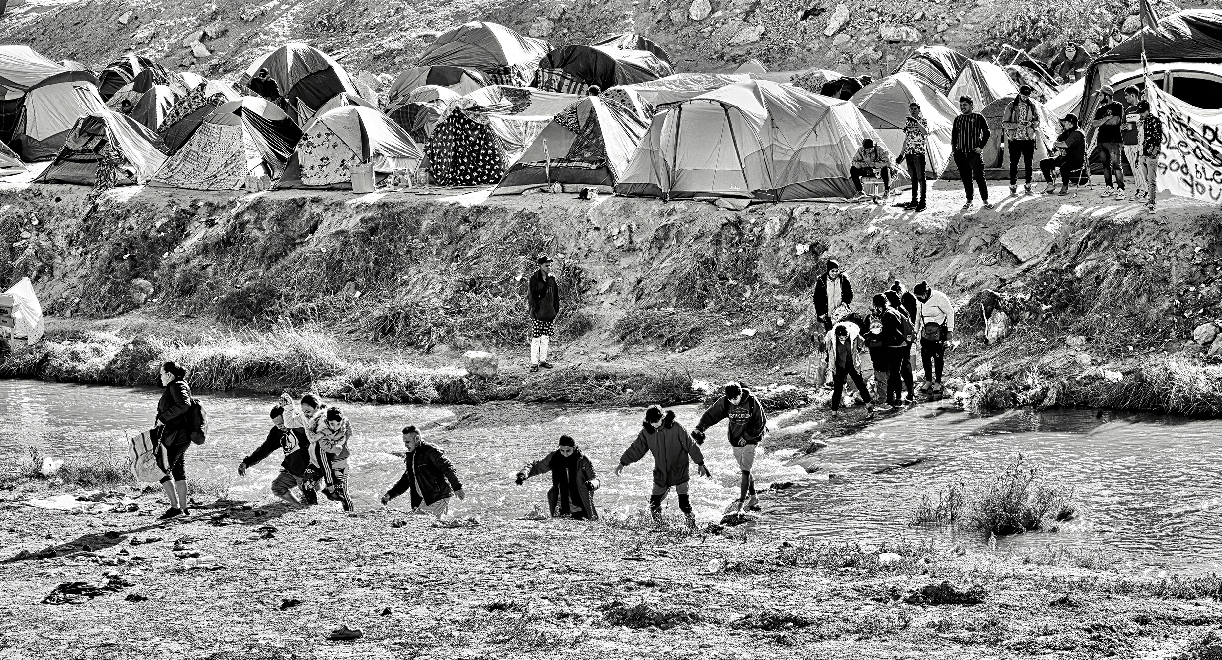 Asylum Seekers Crossing Rio Bravo at Veneuelan Encampment, Juarez, Mexico 2022