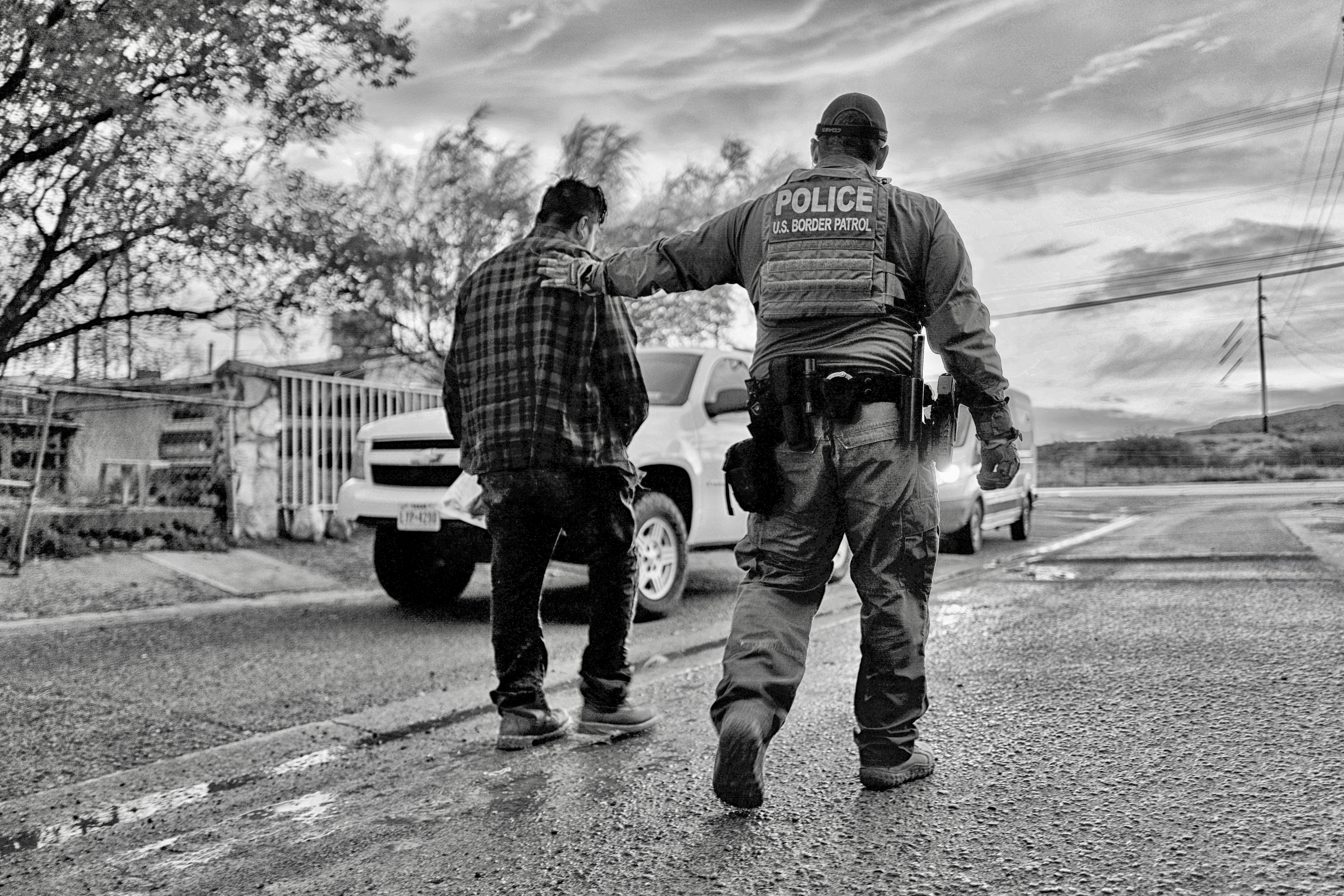 Leading Apprehended Migrant to Truck, Santa Teresa, NM 2022