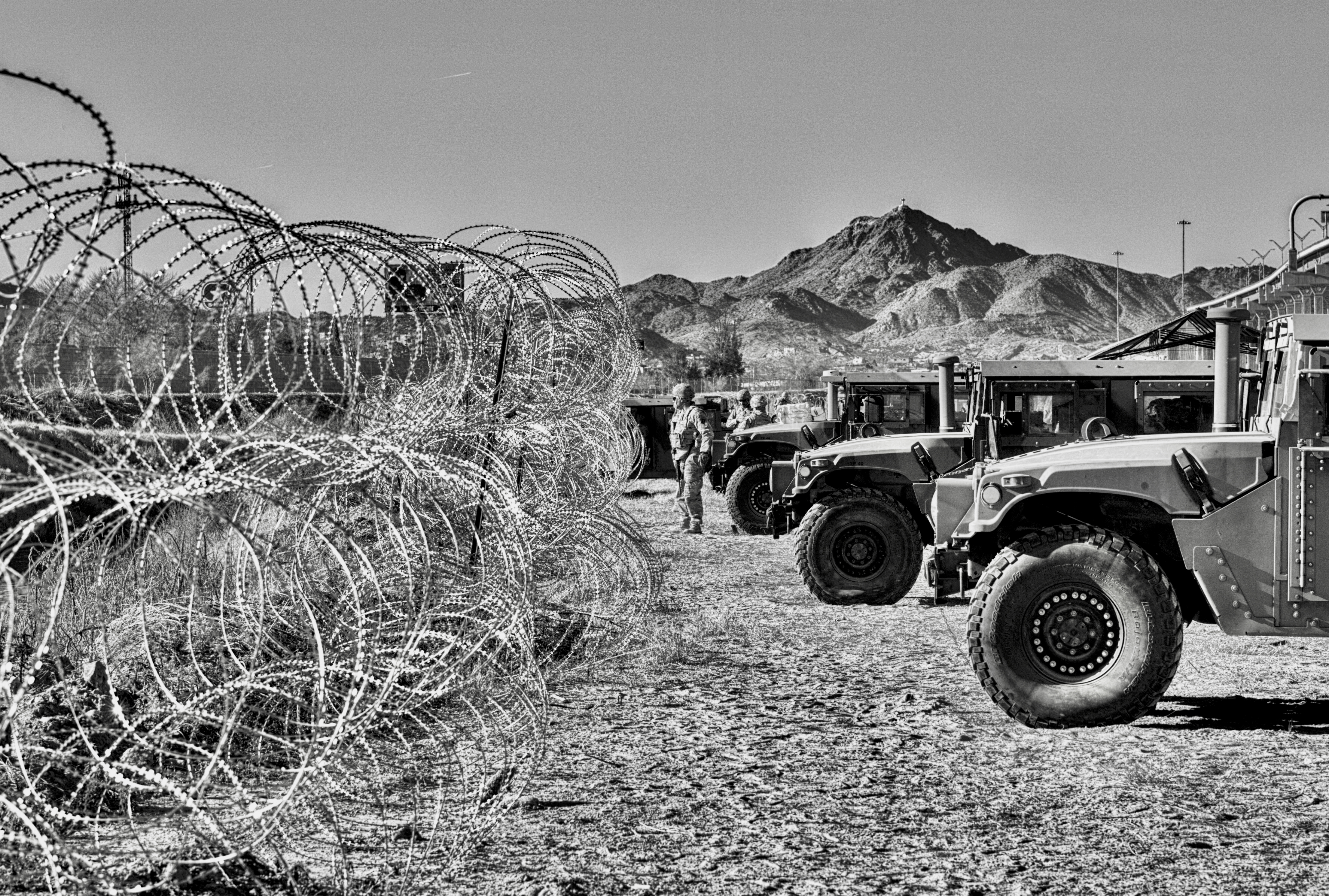 Optics of a War Zone at the US-Mexico Border, Hummers and Razor Wire, El Paso, TX 2023